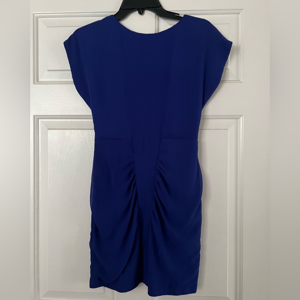 Cute blue dress- never been worn with tags. Cute to wear out for formal or party